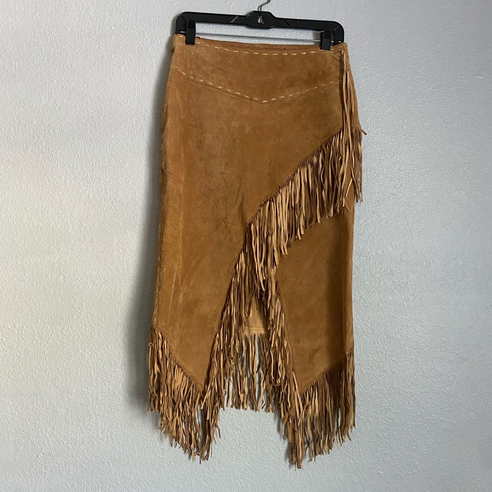 Genuine leather Fringe skirt by BEBE.